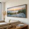 Quadro panorâmico de pôr do sol na praia com dunas e mar, ideal para decoração de sala e quarto